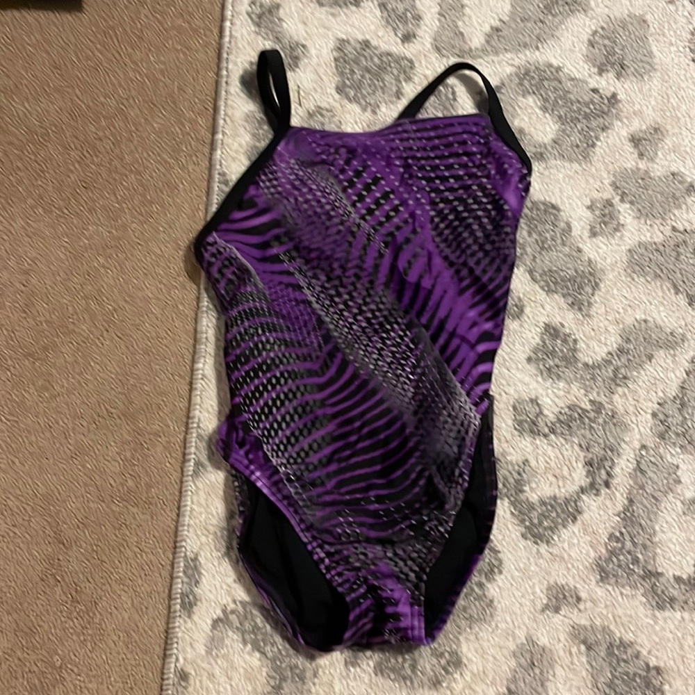Girls purple and silver swimsuit never been worn size 30/ M